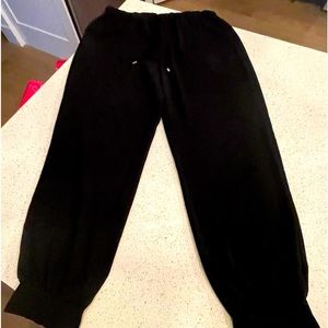 Jogger style dress pant with draw string waist.